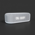 Smart clock front view on dark grey